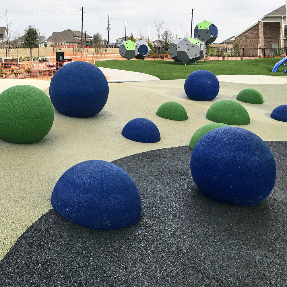 AquaSeal full and half 3-D Play Spheres installed in a playground space